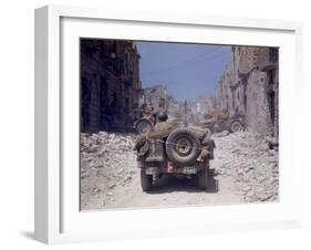 American Jeeps Travelling Through Completely Bombed Out Town During the Drive Towards Rome, Wii-Carl Mydans-Framed Photographic Print