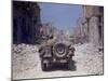 American Jeeps Travelling Through Completely Bombed Out Town During the Drive Towards Rome, Wii-Carl Mydans-Mounted Photographic Print