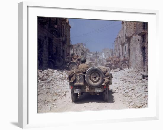 American Jeeps Travelling Through Completely Bombed Out Town During the Drive Towards Rome, Wii-Carl Mydans-Framed Photographic Print