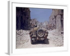 American Jeeps Travelling Through Completely Bombed Out Town During the Drive Towards Rome, Wii-Carl Mydans-Framed Photographic Print