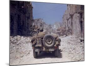 American Jeeps Travelling Through Completely Bombed Out Town During the Drive Towards Rome, Wii-Carl Mydans-Mounted Photographic Print