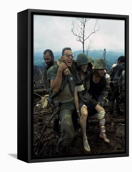 American Marines Aid a Wounded Comrade During Intense Battle for Hill 484-Larry Burrows-Framed Stretched Canvas