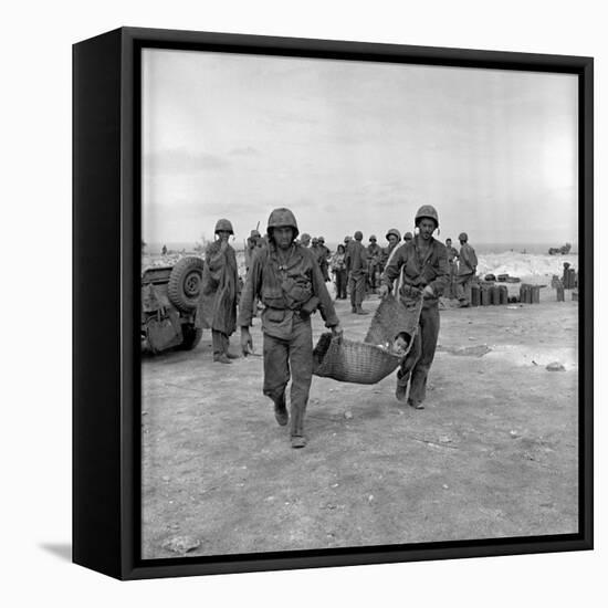 American Marines Carrying a Wounded Child to an Aid Station after the Invasion of Saipan-Peter Stackpole-Framed Stretched Canvas