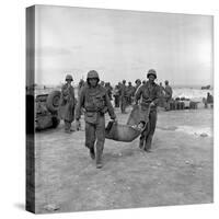 American Marines Carrying a Wounded Child to an Aid Station after the Invasion of Saipan-Peter Stackpole-Stretched Canvas