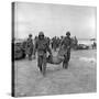 American Marines Carrying a Wounded Child to an Aid Station after the Invasion of Saipan-Peter Stackpole-Stretched Canvas