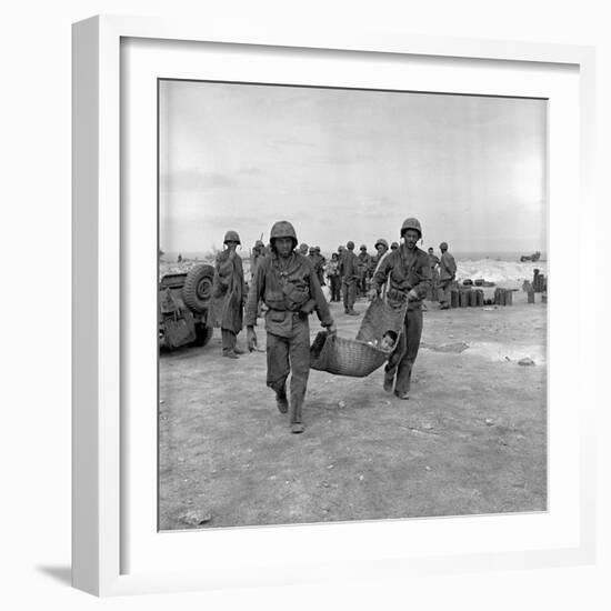 American Marines Carrying a Wounded Child to an Aid Station after the Invasion of Saipan-Peter Stackpole-Framed Photographic Print