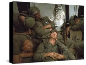 American Marines of 7th Regiment Sleep in Amtrak Following Intense Fighting in Cape Batangan-Paul Schutzer-Stretched Canvas