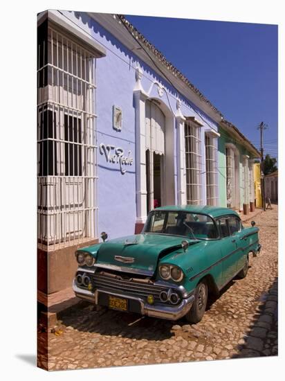 American Oldtimer in the Cobbled Streets of Trinidad, Cuba, West Indies, Caribbean, Central America-null-Stretched Canvas