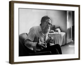 American Poet John Berryman Expressing Himself While Sitting in His Semi Empty Apartment-Mark Kauffman-Framed Premium Photographic Print