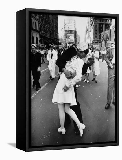 American Sailor Clutching a White-Uniformed Nurse in a Passionate Kiss in Times Square-Alfred Eisenstaedt-Framed Stretched Canvas