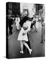 American Sailor Clutching a White-Uniformed Nurse in a Passionate Kiss in Times Square-Alfred Eisenstaedt-Stretched Canvas