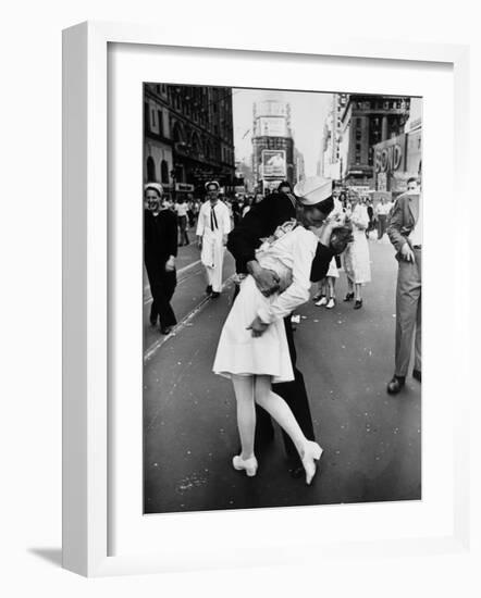 American Sailor Clutching a White-Uniformed Nurse in a Passionate Kiss in Times Square-Alfred Eisenstaedt-Framed Photographic Print