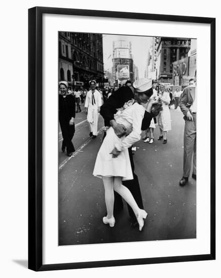 American Sailor Clutching a White-Uniformed Nurse in a Passionate Kiss in Times Square-Alfred Eisenstaedt-Framed Photographic Print