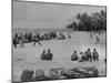 American Servicemen Playing Softball on an Idle Stretch of Runway While Other Soldiers Look On-J^ R^ Eyerman-Mounted Photographic Print