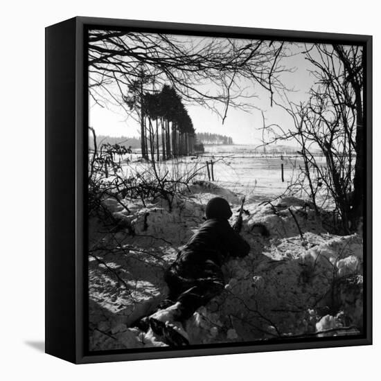 American Soldier Peering Across Snowy Field During Counter Offensive Known as Battle of the Bulge-John Florea-Framed Stretched Canvas