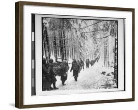 American soldiers on their tay to cut Off St. Vith Houffalize Road in Belgium, During WWII-Richard A^ Massenge-Framed Photographic Print