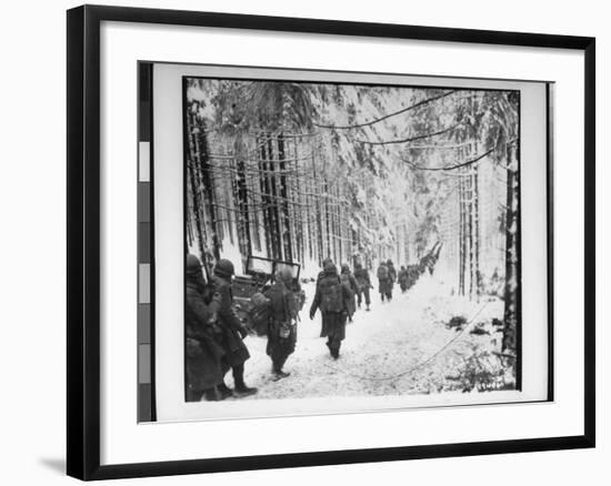 American soldiers on their tay to cut Off St. Vith Houffalize Road in Belgium, During WWII-Richard A^ Massenge-Framed Photographic Print