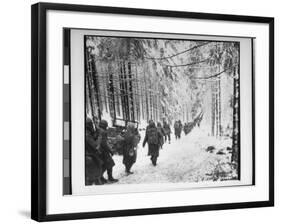 American soldiers on their tay to cut Off St. Vith Houffalize Road in Belgium, During WWII-Richard A^ Massenge-Framed Photographic Print