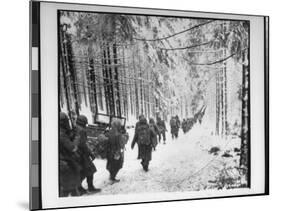 American soldiers on their tay to cut Off St. Vith Houffalize Road in Belgium, During WWII-Richard A^ Massenge-Mounted Photographic Print
