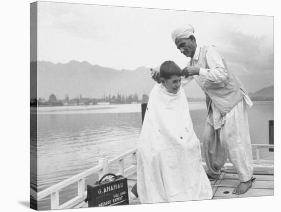 American Tourist, Young Danny Thomas Receiving Hair Cut on House Boat During Vacationing-James Burke-Stretched Canvas