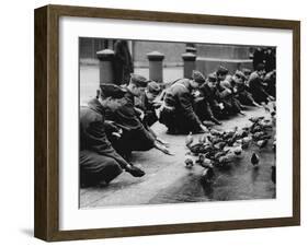 American Troops Feeding Pigeons-Associated Newspapers-Framed Photo