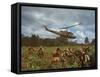 American UH1 Huey Helicopter Lifting Off as Personnel on the Ground Protect Themselves-Larry Burrows-Framed Stretched Canvas