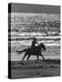 American Visitors Enjoying Horseback Riding on Rosarita Beach-Allan Grant-Stretched Canvas