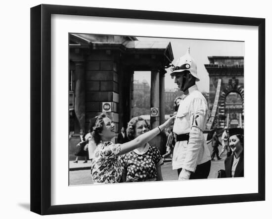 American Women Mobbing a Policeman on Traffic Duty at the Chain Bridge-null-Framed Photographic Print