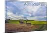 Amish Country - Farmer and Hot Air Balloons-Lantern Press-Mounted Art Print