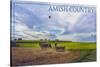 Amish Country - Farmer and Hot Air Balloons-Lantern Press-Stretched Canvas