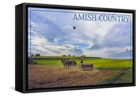 Amish Country - Farmer and Hot Air Balloons-Lantern Press-Framed Stretched Canvas