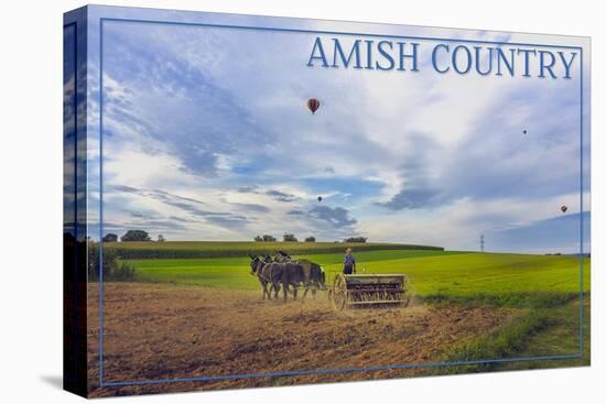 Amish Country - Farmer and Hot Air Balloons-Lantern Press-Stretched Canvas