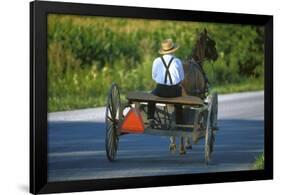 Amish driving a horse-drawn cart, Pennsylvania, USA-null-Framed Art Print