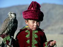 Young Boy Holding a Falcon, Golden Eagle Festival, Mongolia-Amos Nachoum-Photographic Print