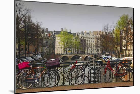 Amsterdam Bicycles on Bridge over Canal-Anna Miller-Mounted Photographic Print