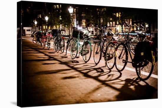 Amsterdam Bikes at Night I-Erin Berzel-Stretched Canvas