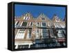 Amsterdam townhouses with beer ads-Jan Halaska-Framed Stretched Canvas