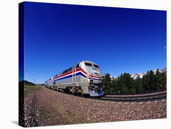 Amtrak Train at Marias Pass, Montana, USA-Chuck Haney-Stretched Canvas