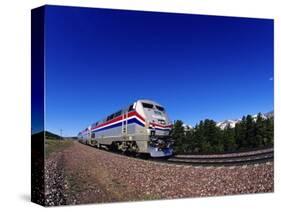 Amtrak Train at Marias Pass, Montana, USA-Chuck Haney-Stretched Canvas