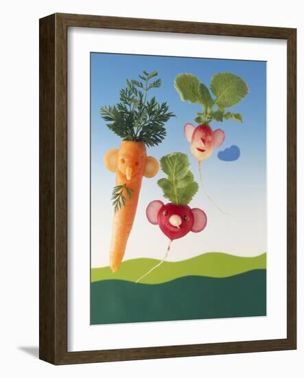 Amusing Carrot and Radish Figures-Ulrich Kerth-Framed Photographic Print