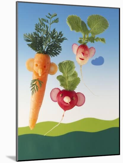 Amusing Carrot and Radish Figures-Ulrich Kerth-Mounted Photographic Print