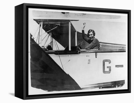 Amy Johnson (Mrs Mollison) Sits in Her Plane and Smiles and Waves to the Camera-null-Framed Stretched Canvas