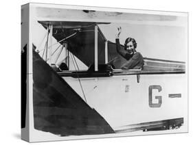 Amy Johnson (Mrs Mollison) Sits in Her Plane and Smiles and Waves to the Camera-null-Stretched Canvas