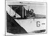 Amy Johnson (Mrs Mollison) Sits in Her Plane and Smiles and Waves to the Camera-null-Mounted Art Print