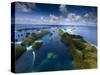 An Aerial View of a Boat as it Speeds Through the Rock Islands, Republic of Palau.-Ian Shive-Stretched Canvas