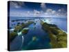 An Aerial View of a Boat as it Speeds Through the Rock Islands, Republic of Palau.-Ian Shive-Stretched Canvas