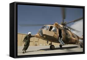 An Afghan Air Force Aerial Gunner Makes Final Checks on a Mi-17 Helicopter-null-Framed Stretched Canvas