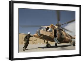 An Afghan Air Force Aerial Gunner Makes Final Checks on a Mi-17 Helicopter-null-Framed Photographic Print