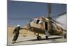 An Afghan Air Force Aerial Gunner Makes Final Checks on a Mi-17 Helicopter-null-Mounted Photographic Print