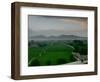 An Afghan Man Rides His Bicycle on a Dirt Road on the Northern Edge of Kabul, Afghanistan-David Guttenfelder-Framed Photographic Print